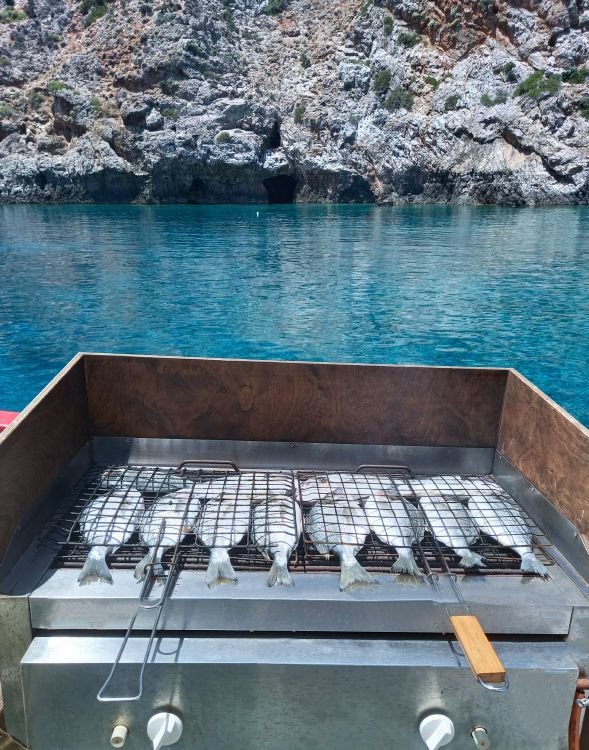 Let's Go Fishing. Grill and Eat fresh fish. Fishing Trips in Crete, Greece