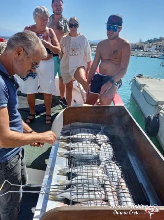 Fish on the grill with Let's Go Fishing Fishing Trips in Chania Greece.